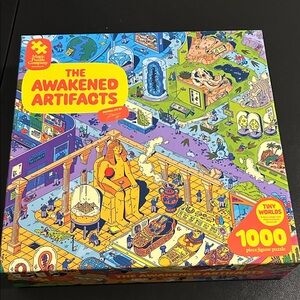 2 puzzles -Awakened Artifacts 1000-Piece Puzzle and quokka seek and see puzzle